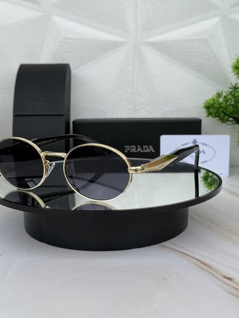 🕶️ Lentes Prada Ovalados – Lujo, Estilo y Protección Total