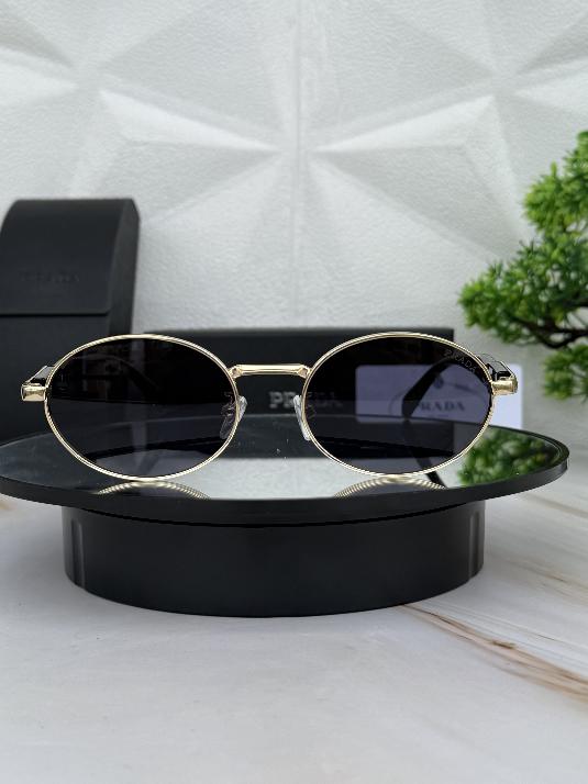 🕶️ Lentes Prada Ovalados – Lujo, Estilo y Protección Total