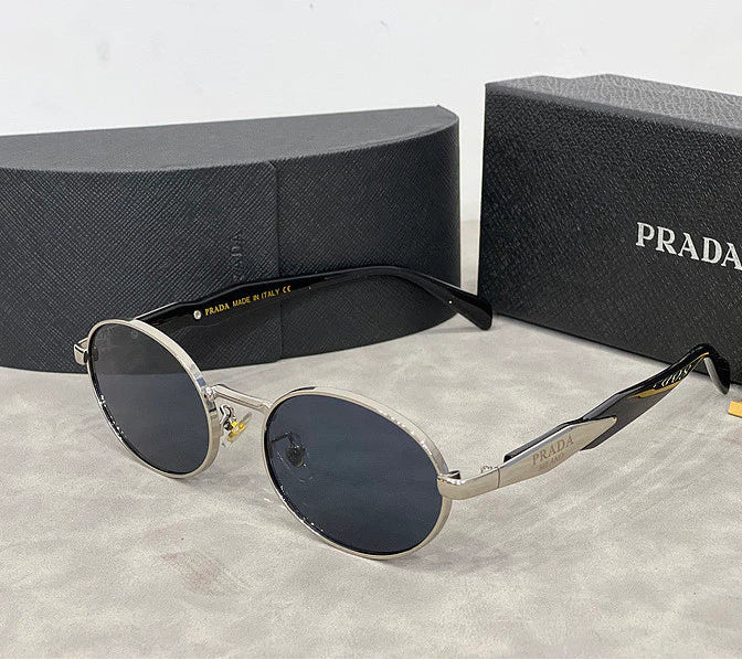 🕶️ Lentes Prada Ovalados – Lujo, Estilo y Protección Total