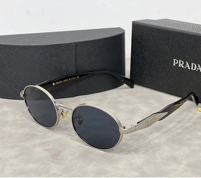 🕶️ Lentes Prada Ovalados – Lujo, Estilo y Protección Total